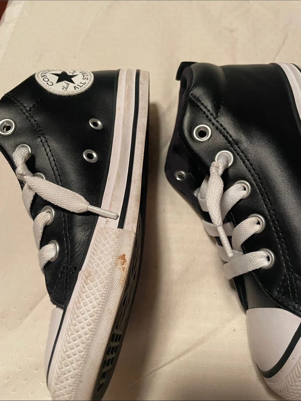 Converse Kids Black High-Top Sneakers with White Accents.  Leather look.